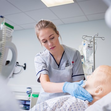 Student nurse working