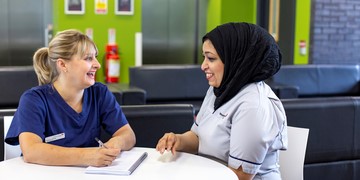 Discussion between nursing student and Lecturer